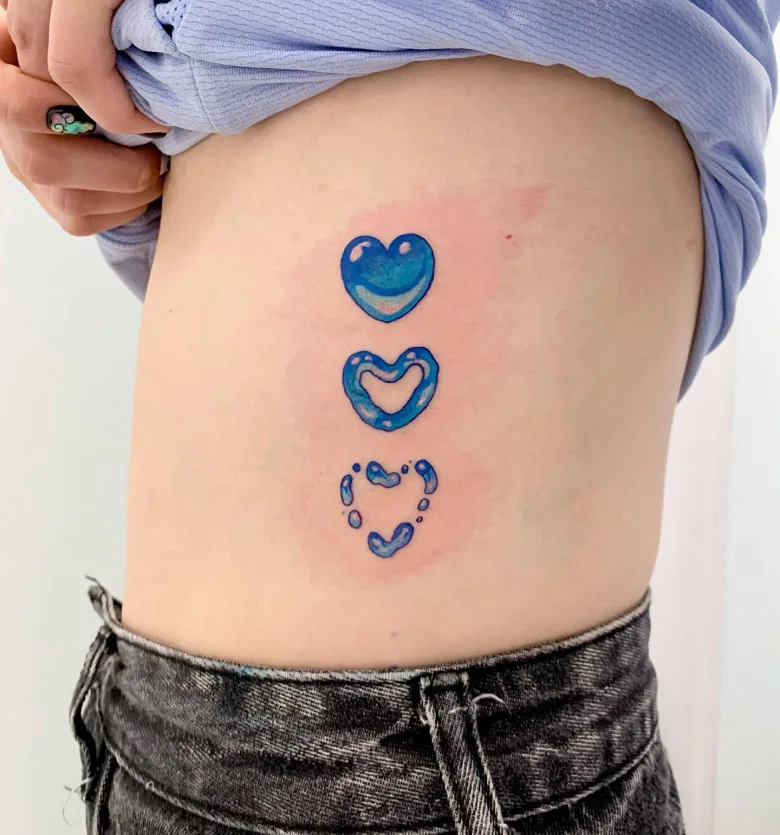 Tattoo artist Zvee