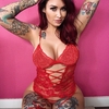 Tattooed model and DJ Laura Lux