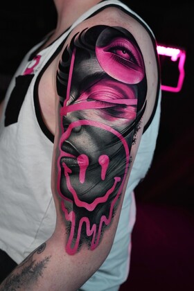 Neon pink in the black-and-grey world of Ruslan Millinhton's tattoos