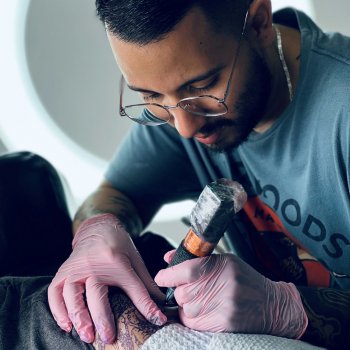 Tattoo artist Sebastián González