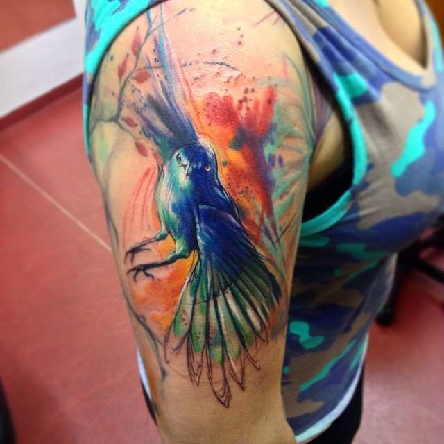Tattoo artist Adam Kremer watercolor tattoo