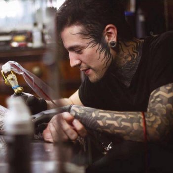 Tattoo artist Eric Stricker