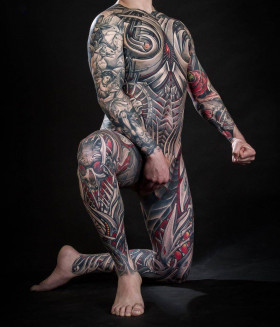 Full body suit biomechanical tattoos by Javier Obregon