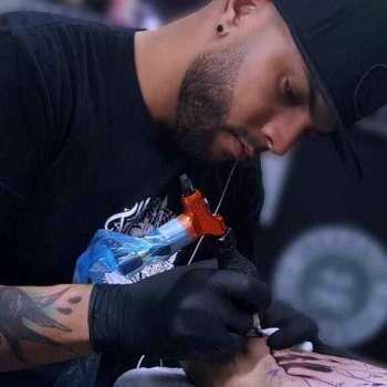 Tattoo artist Guzman Perez (Bolo)