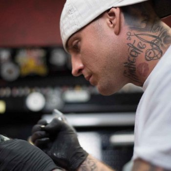 Tattoo artist Kris Busching