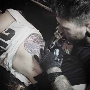 Tattoo artist Chris Bint