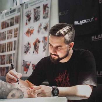 Tattoo artist Дени Актемиров