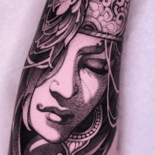 prompthunt engravingstyle tattoo of regal female boddhisatva on stomach