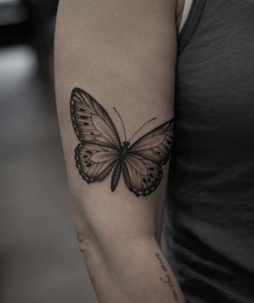 Elizabeth Markov's refined tattoos