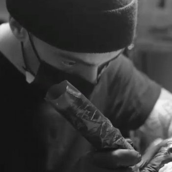Tattoo artist Sad Amish Tattooer