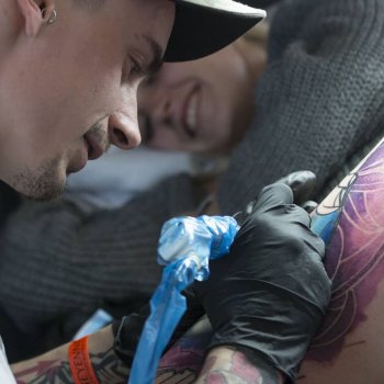 Tattoo artist Miras Snower