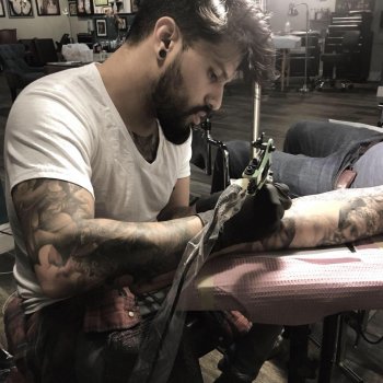 Tattoo artist Jose Legion Avegno