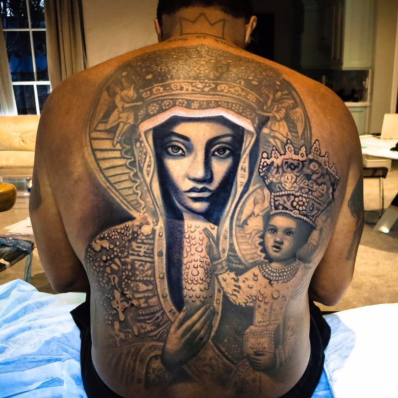 Diddy's Arrest and the Symbolism Behind His Tattoo: Unraveling the Connection to Ezili Dantor