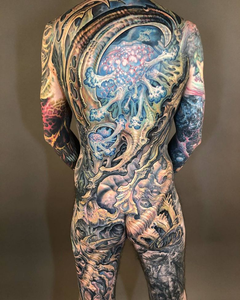 Tattoo artist Guy Aitchison, color biomechanical tattoo, Giger style | USA