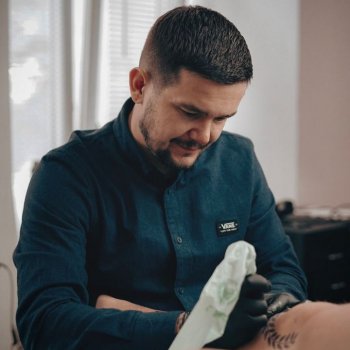 Tattoo artist Sławek Pawlik