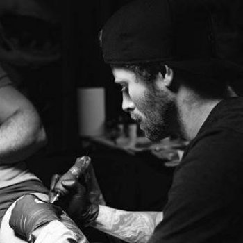 Tattoo artist Michael Cloutier