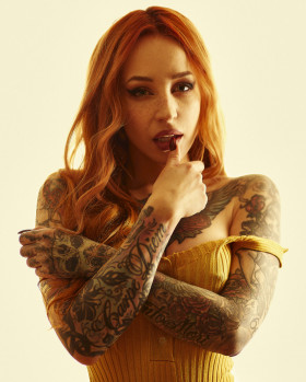 Hot tattoo model Yana Sinner in a photo shoot by Daniele Dentamaro