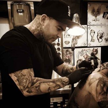 Tattoo artist Drew Apicture