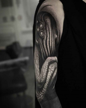 Tattoo artist Deni Aktemirov