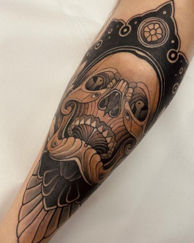 Neo-traditional tattoos in a discreet palette by Georg Faust