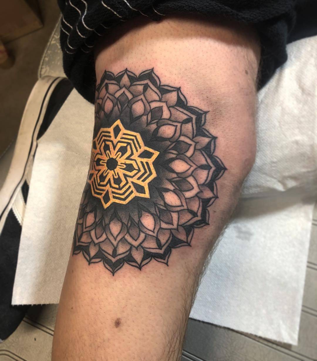 Tattoo artist Jake Gordon, authors style color traditional tattoo with black ornamentalistic background | USA