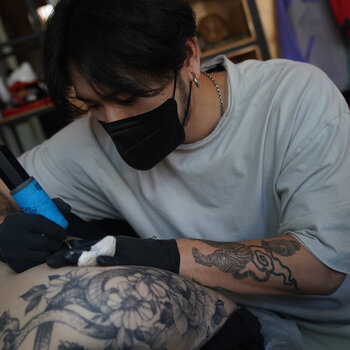 Tattoo artist Zee