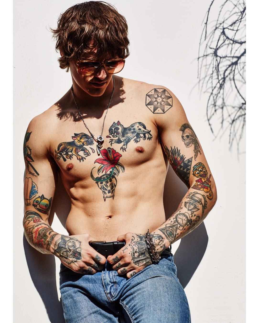 Tattooed model Leebo Freeman, male alternative photo model, DJ | London, UK