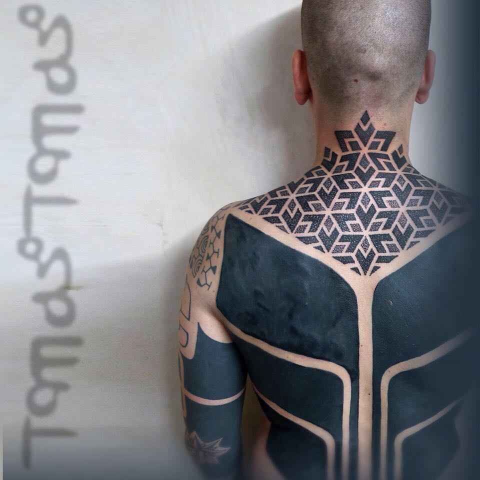 Large-scale ornamental tattoo by Tomas Tomas | iNKPPL