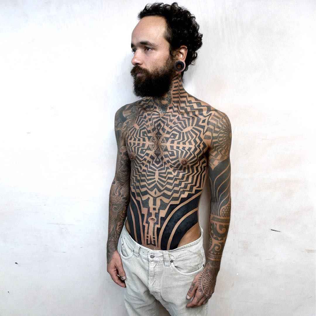 Large-scale ornamental tattoo by Tomas Tomas | iNKPPL