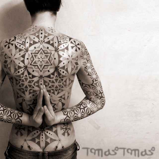 Large scale ornamental tattoo by Tomas Tomas