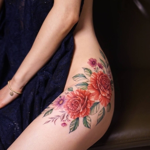 Female Color Botanical tattoo on Thigh #29780 | Tattoo Artist Silo