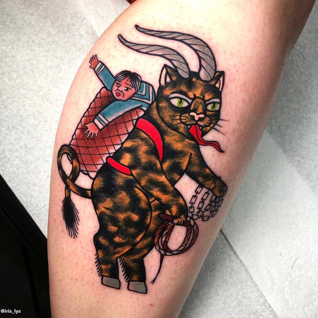 Tattoo artist Iris Lys, color traditional cat tattoo | United Kingdom