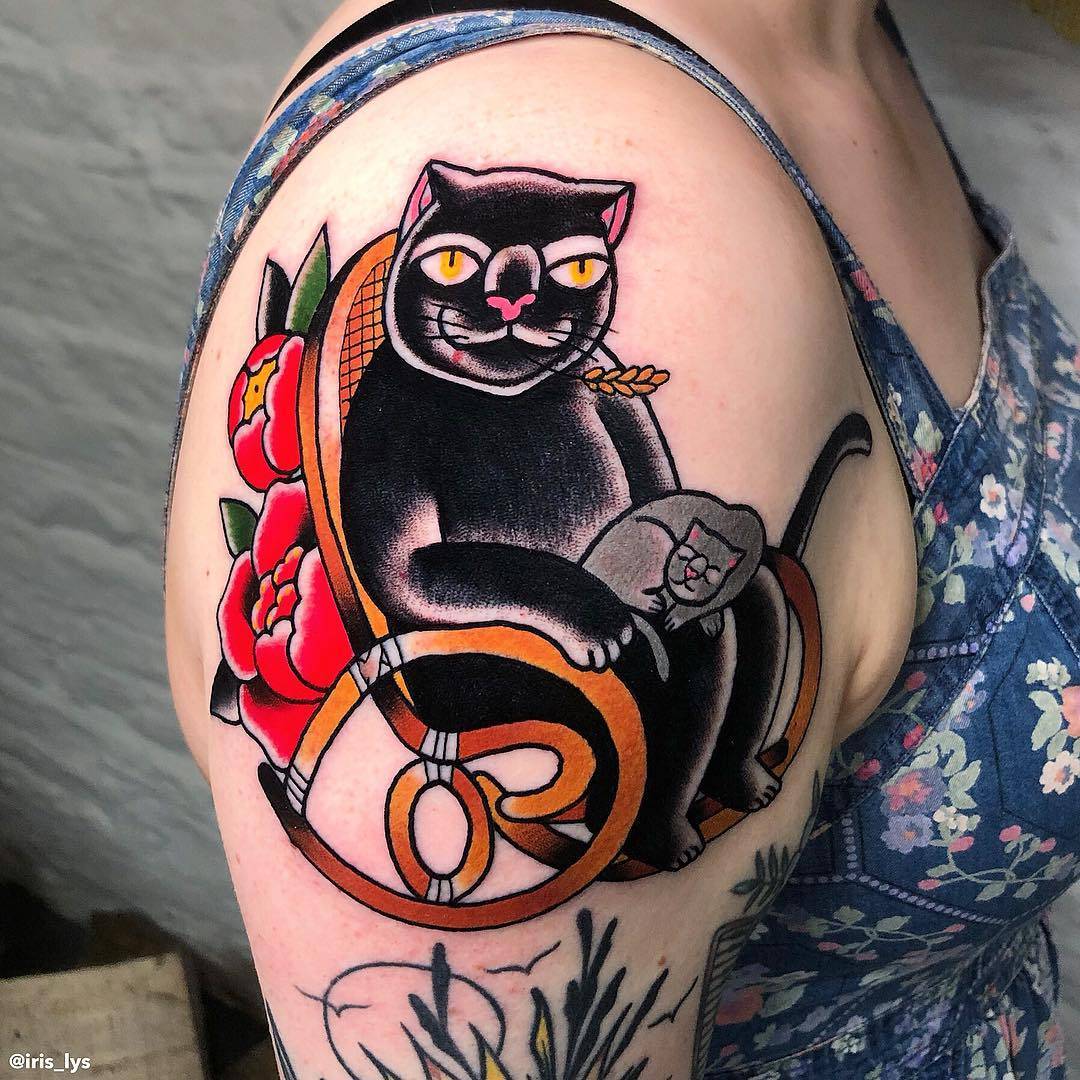 Tattoo artist Iris Lys, color traditional cat tattoo | United Kingdom