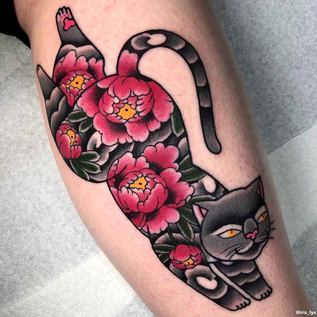 Tattoo artist Iris Lys, color traditional cat tattoo | United Kingdom