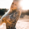 Tattooed model Nerdygirl2.0 (GymGameGirl)