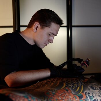 Tattoo artist Akulov Mark