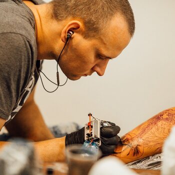 Tattoo artist Evgeniy Tkach
