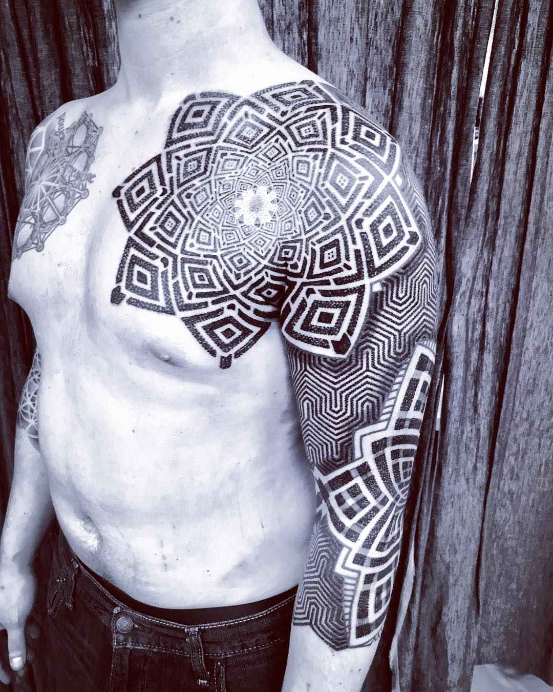 Tattoo artist Matt Black, black ornamental tattoo | USA