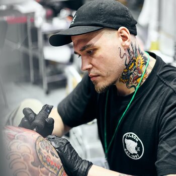 Tattoo artist Sergei Lepekhin 