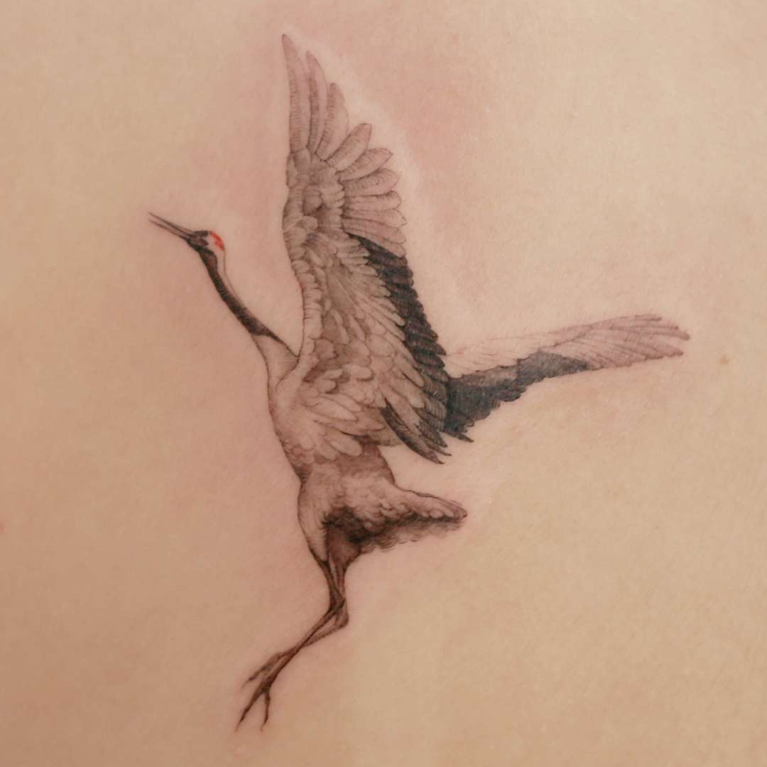 50 Creative Crane Tattoos