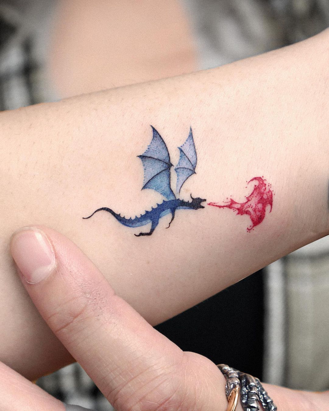 Tattoo uploaded by Tattoodo • Matching dragon wrist tattoos by Kim HeyMin.  #KimHeyMin #dotwork #fine #pointillism #dragon #matchingtattoos • Tattoodo