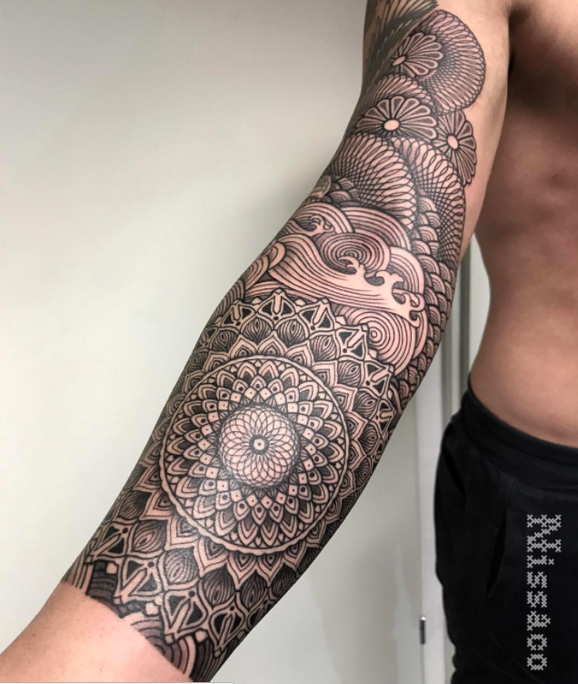 tattoo artist Nicasso ornamental graphic tattoo