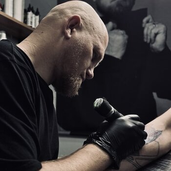 Tattoo artist Vasiliy Kushnarenko