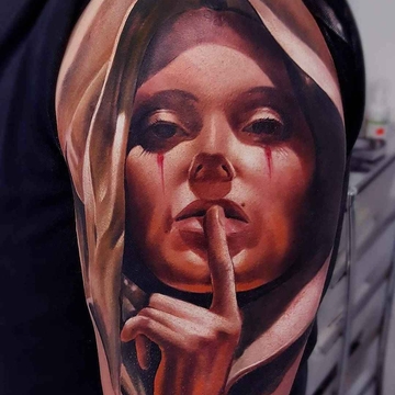 Tattoo artist Andrzej Niuniek Misztal