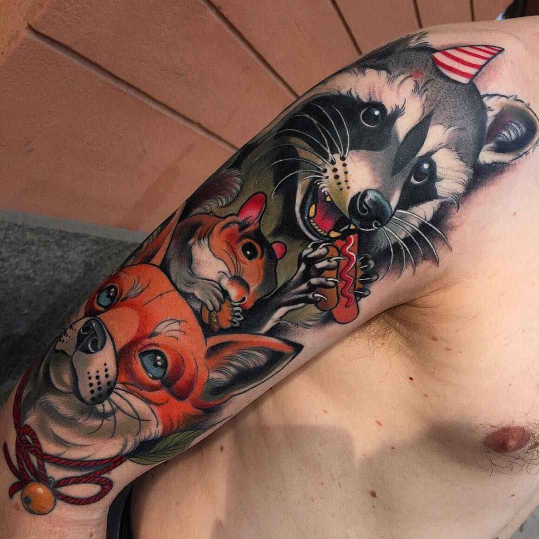 Neotraditional racoon portrait tattoo on the thigh
