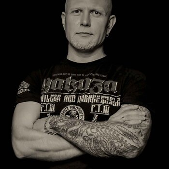 Tattoo artist Aleksandr Kosach