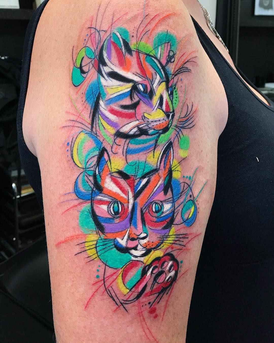 Tattoo artist Sebastian Barone bright color cubism tattooo