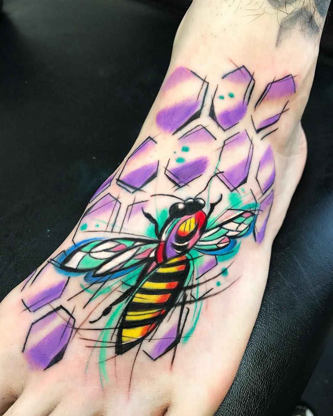 Tattoo artist Sebastian Barone bright color cubism tattooo