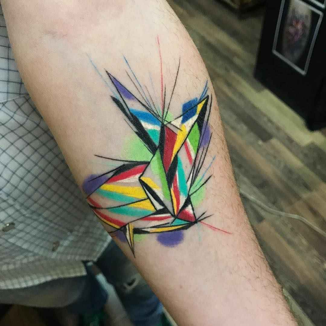 Tattoo artist Sebastian Barone bright color cubism tattooo