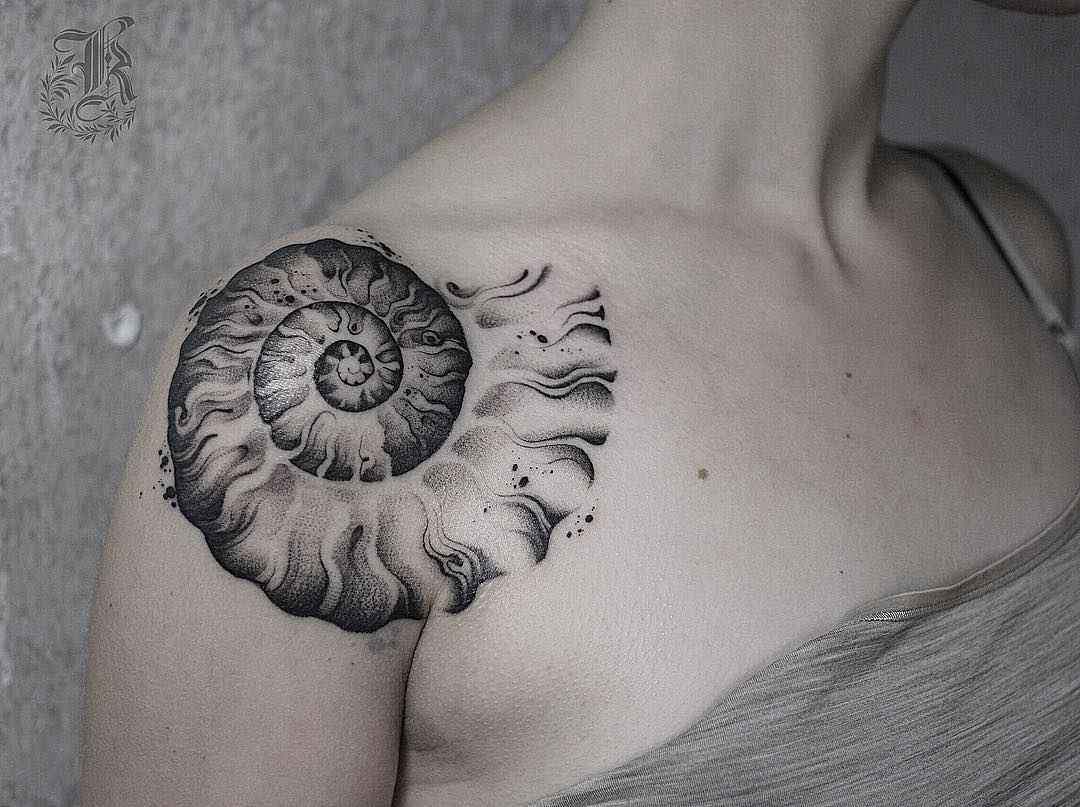 Tattoo artist Kristina Darmaeva authors dotwork tattoo